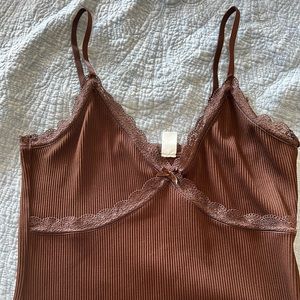 Brown slip dress. Excellent condition only worn once. Straps adjustable.